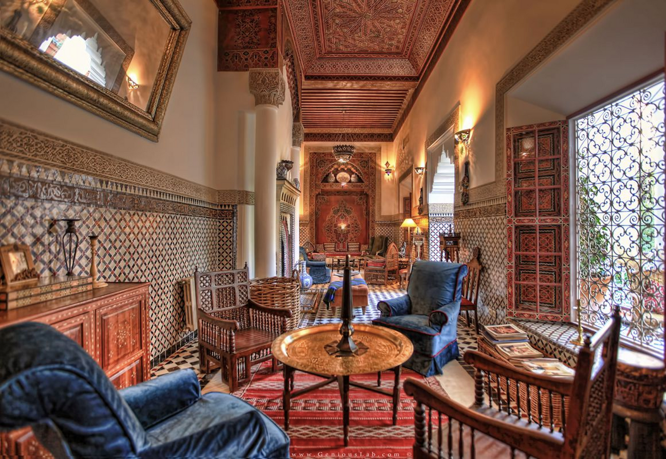 Moroccan interior with carved wood furniture and traditional decorative details