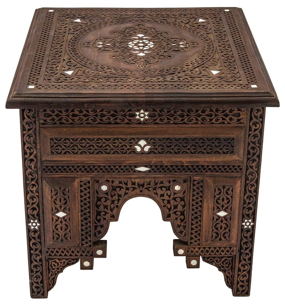 Handcrafted carved wood furniture from our collection